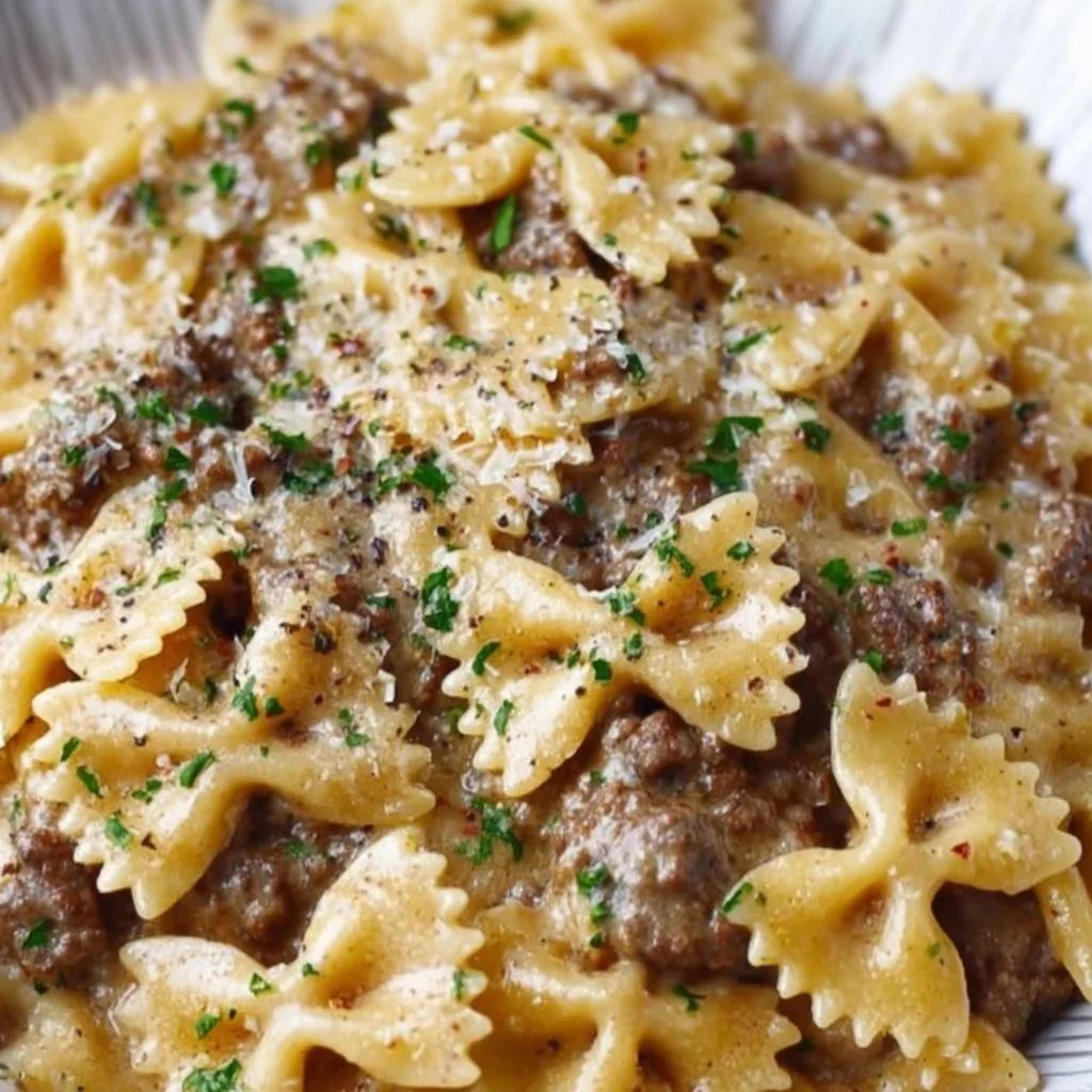 Creamy Parmesan Garlic Beef Bowtie Pasta served in a bowl