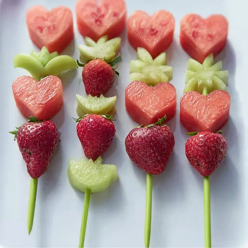 Colorful fruit wands made with fresh fruit on skewers for a fun treat