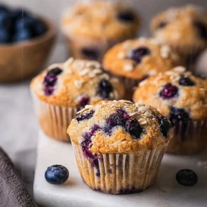 Delicious vegan blueberry muffins fresh out of the oven.