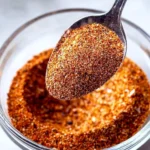 Homemade blackening seasoning blend in a bowl for flavoring dishes.