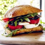 High-protein gluten-free Caprese sandwich with fresh mozzarella, tomatoes, and basil