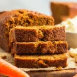 Freshly baked carrot cake loaf with cream cheese frosting