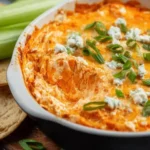 Healthy cottage cheese buffalo chicken dip served in a bowl