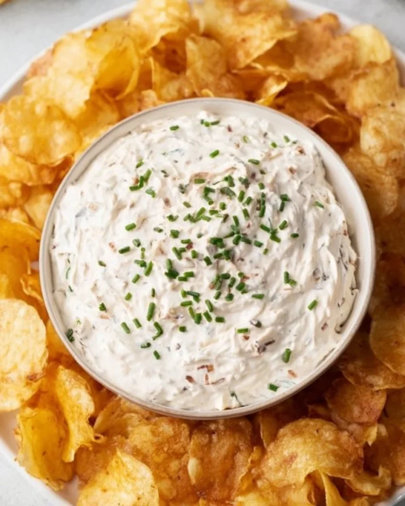 Healthy Greek yogurt onion dip served in a bowl with fresh vegetables