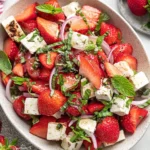 Delicious strawberry feta salad with fresh ingredients and creamy dressing.