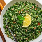 Colorful Tabbouleh salad with parsley, tomatoes, and bulgur wheat for a healthy meal prep.