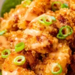 Crispy Air Fryer Bang Bang Shrimp served with a spicy dipping sauce