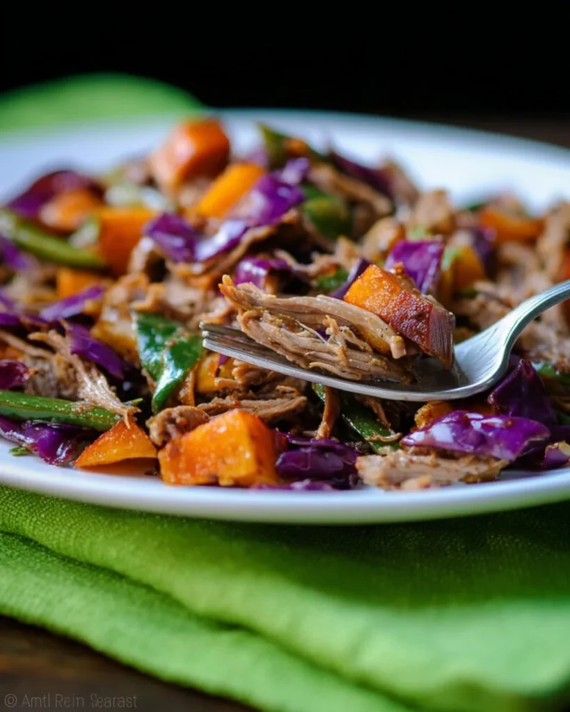 Delicious BBQ brisket hash with potatoes, peppers, and onions on a plate