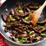 Delicious Beef Bulgogi on a plate with vegetables and rice