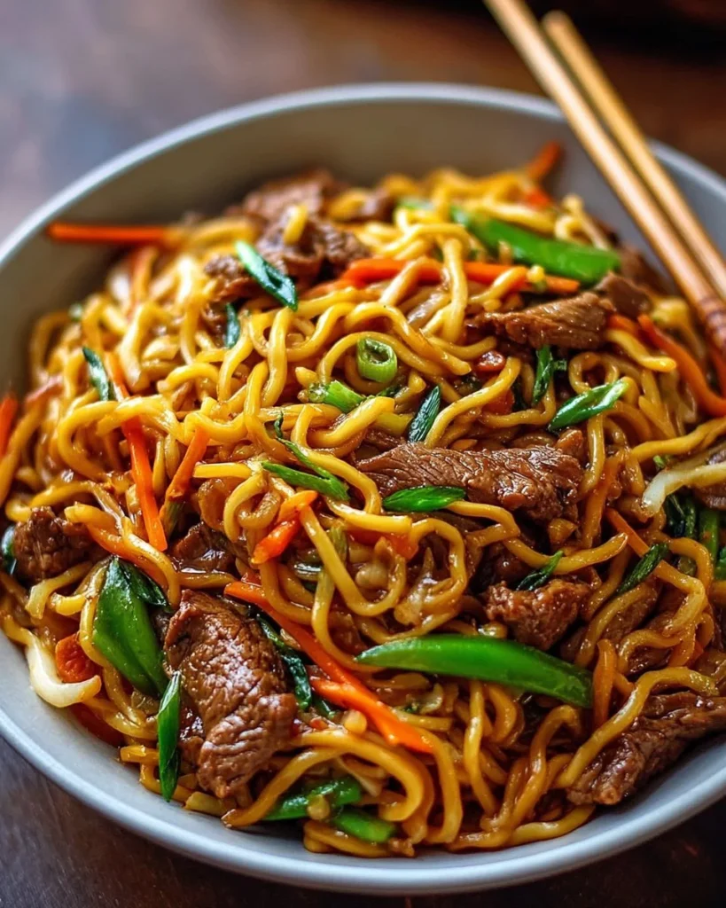 Delicious Beef Chow Mein served with vibrant vegetables and noodles