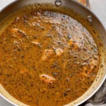 Delicious Chicken Pan Sauce drizzled over roasted chicken and vegetables.