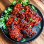 Delicious chicken tikka marinated in spices ready for grilling