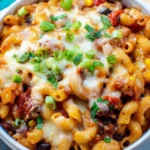 Delicious bowl of Chili Mac and Cheese with melted cheese and chili toppings