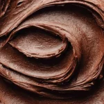 Delicious chocolate fudge frosting on a cake