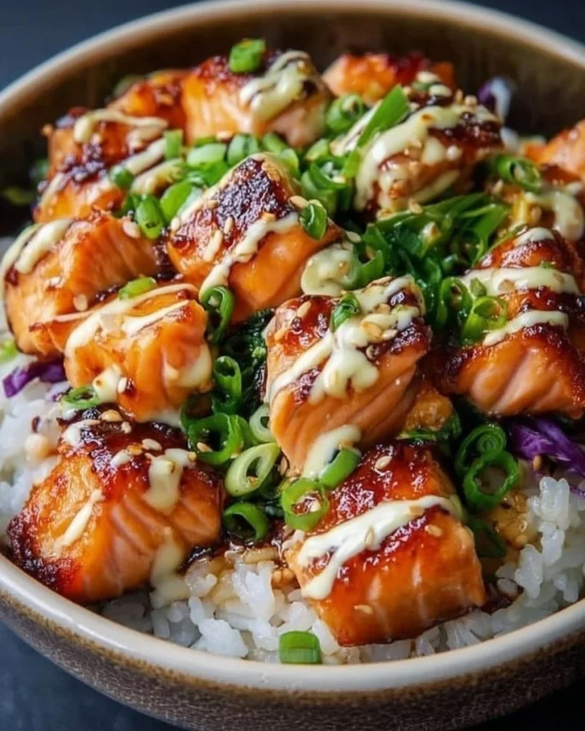 Crispy salmon and rice bowl served in a healthy, colorful dish