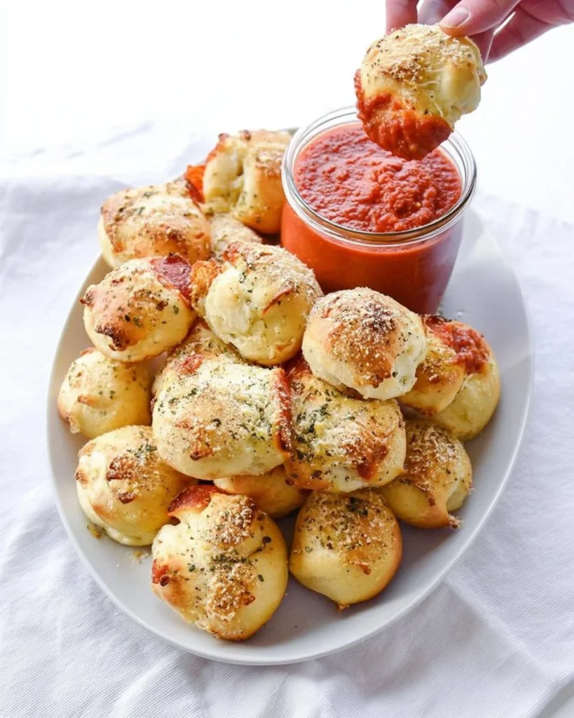 Garlic Butter Pepperoni Pizza Rolls on a plate, perfect for snacking.