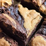 Delicious Peanut Butter Brookies served on a plate with chocolate drizzle