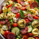 Salami-Mozzarella Tortellini Pasta Salad on a serving plate