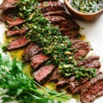 Delicious grilled skirt steak served with homemade chimichurri sauce.
