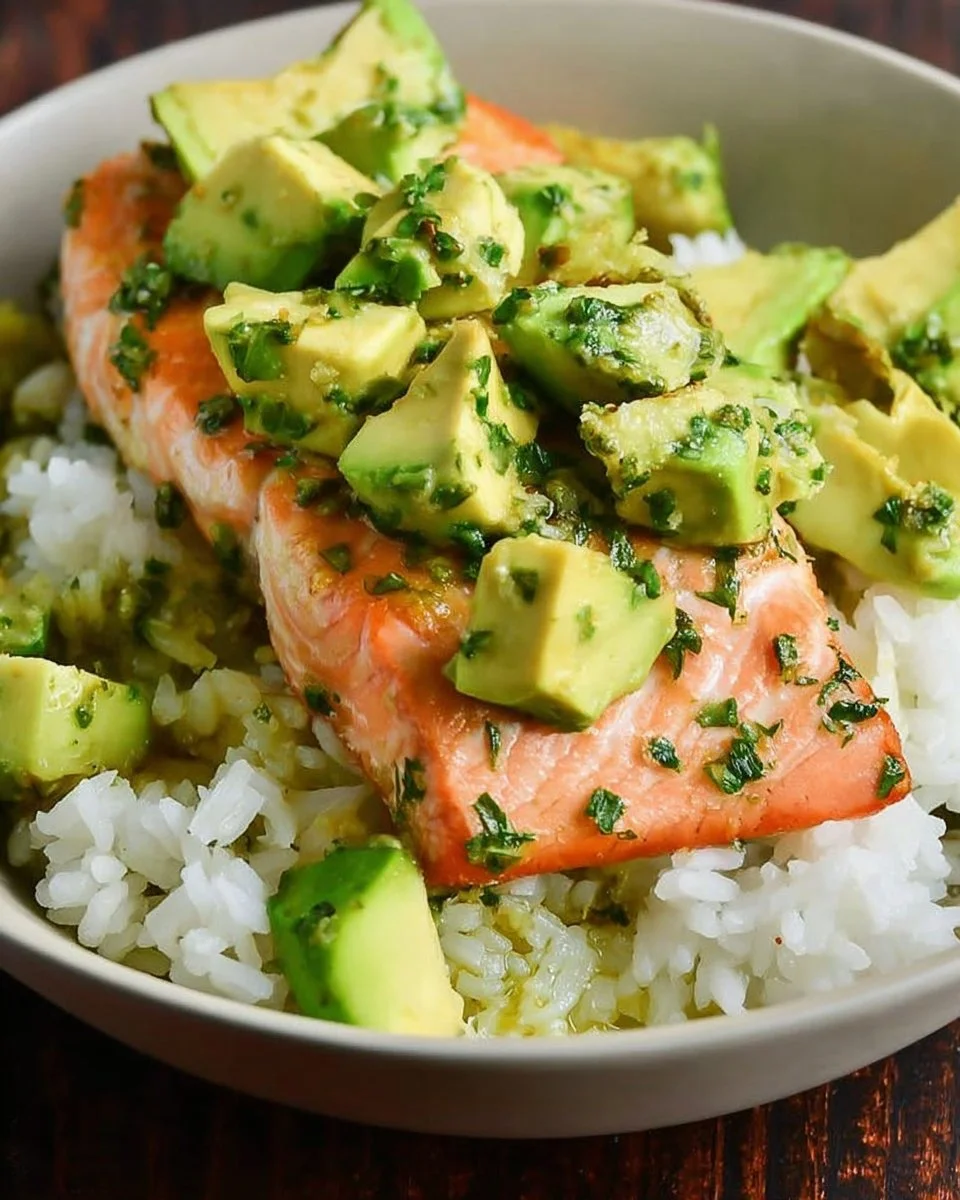 A tasty Avocado Salmon Rice Bowl topped with fresh ingredients.