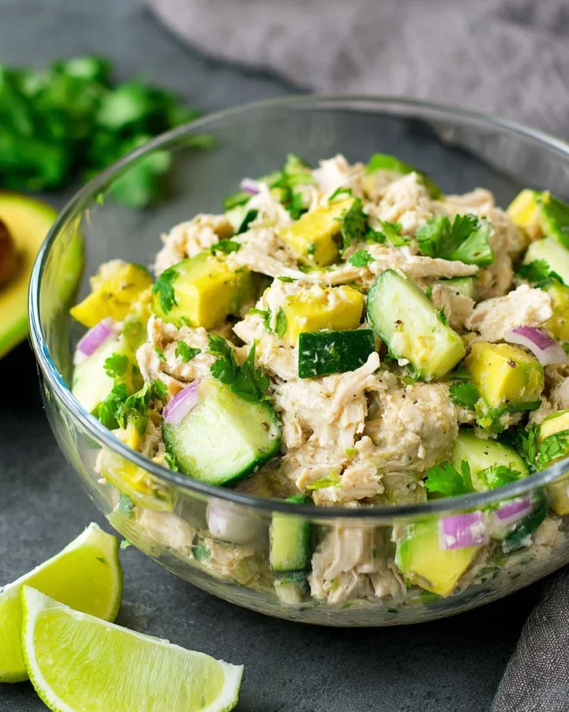 Avocado Tuna Salad with fresh ingredients in a bowl