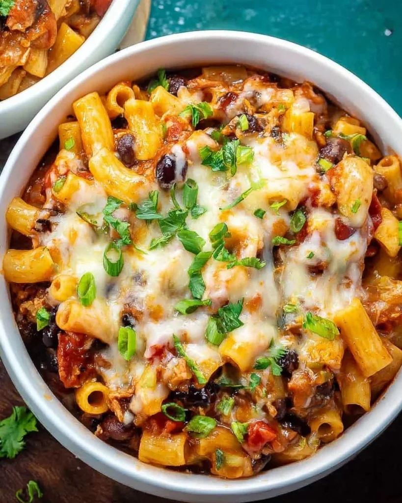 Delicious Chili Mac and Cheese served in a bowl with toppings