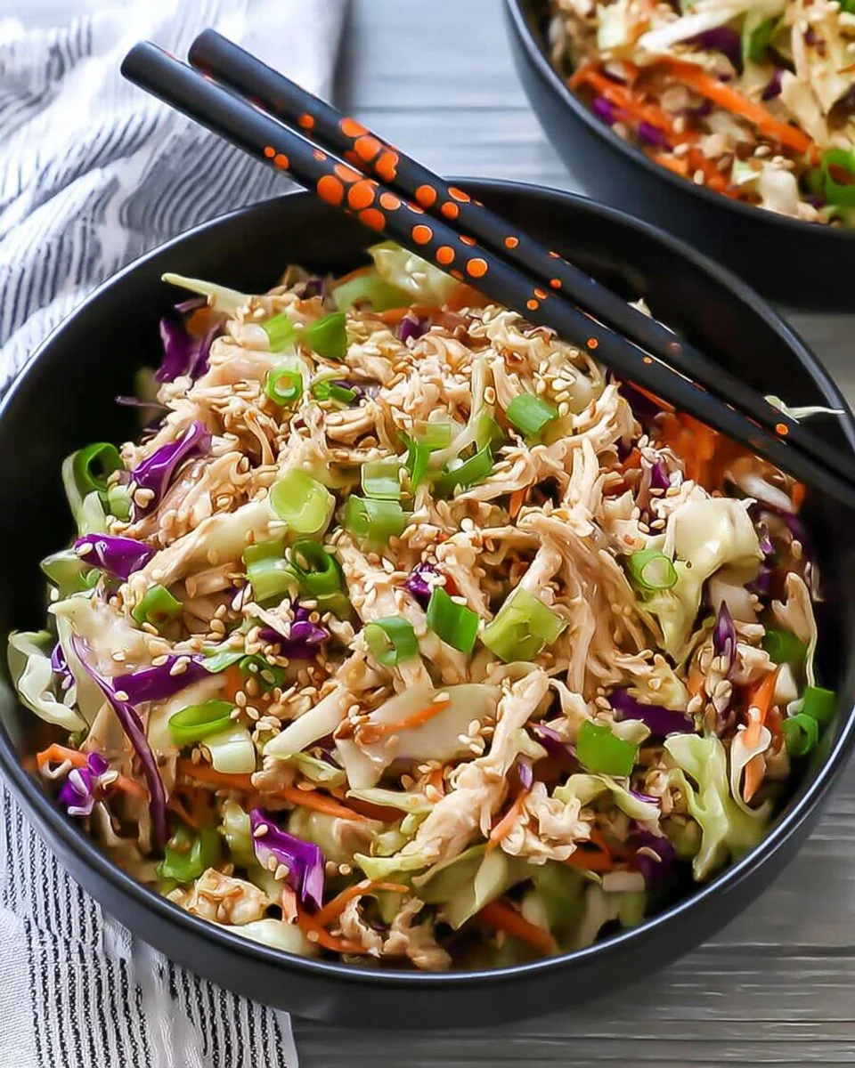 Chinese Chicken Salad with vibrant vegetables and sesame dressing served in a bowl