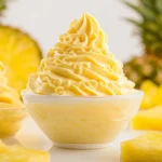 Refreshing Dole Whip dessert served in a cup, tropical treat