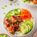 Delicious teriyaki salmon bowl with vegetables and rice