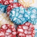 Red White & Blue Cake Mix Crinkle Cookies displayed on a plate