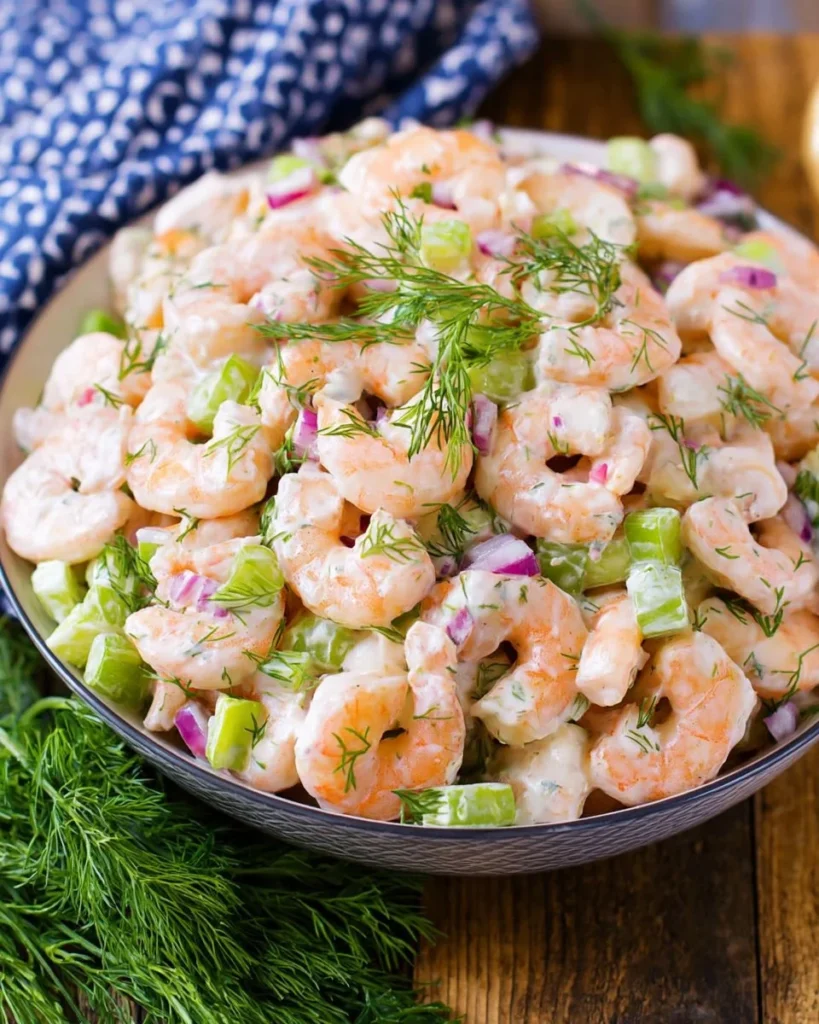 Fresh and colorful shrimp salad with vegetables and dressing