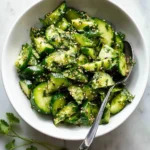 Smashed cucumber salad with vibrant vegetables and fresh herbs