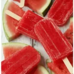 Delicious homemade Strawberry Watermelon Popsicles in vibrant colors