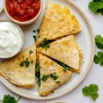 Crispy Air Fryer Quesadilla served with salsa and guacamole