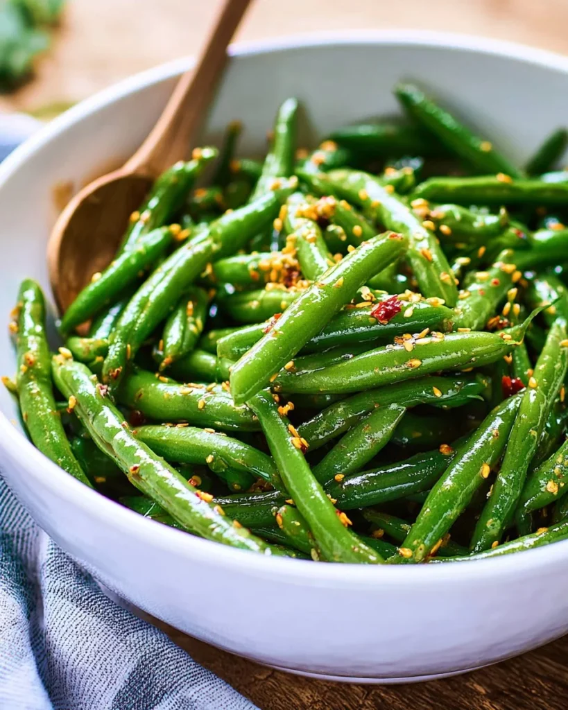 Asian green bean salad with colorful vegetables and sesame dressing