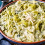 Delicious creamed leeks served in a bowl with herbs and spices