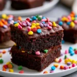 Delicious homemade cosmic brownies with colorful sprinkles on top.