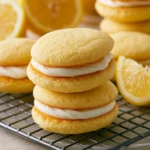 Lemon Whoopie Pies - Soft cake-like sandwich cookies with lemon filling
