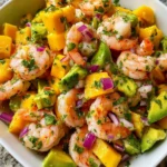 Mango Pineapple Shrimp Salad with fresh ingredients on a plate