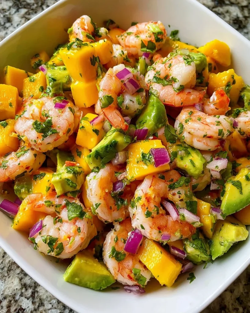 Mango Pineapple Shrimp Salad with fresh ingredients on a plate