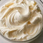 Bowl of fluffy mascarpone whipped cream topping desserts