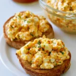 No mayo spicy egg salad with peppers and herbs in a bowl
