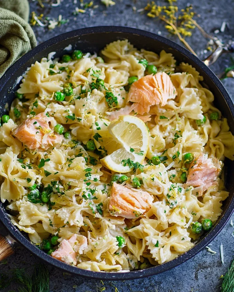 Delicious Salmon and Crème Fraîche Pasta dish topped with herbs