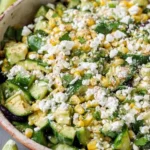 Delicious TexMex Cucumber and Corn Salad with fresh vegetables and herbs