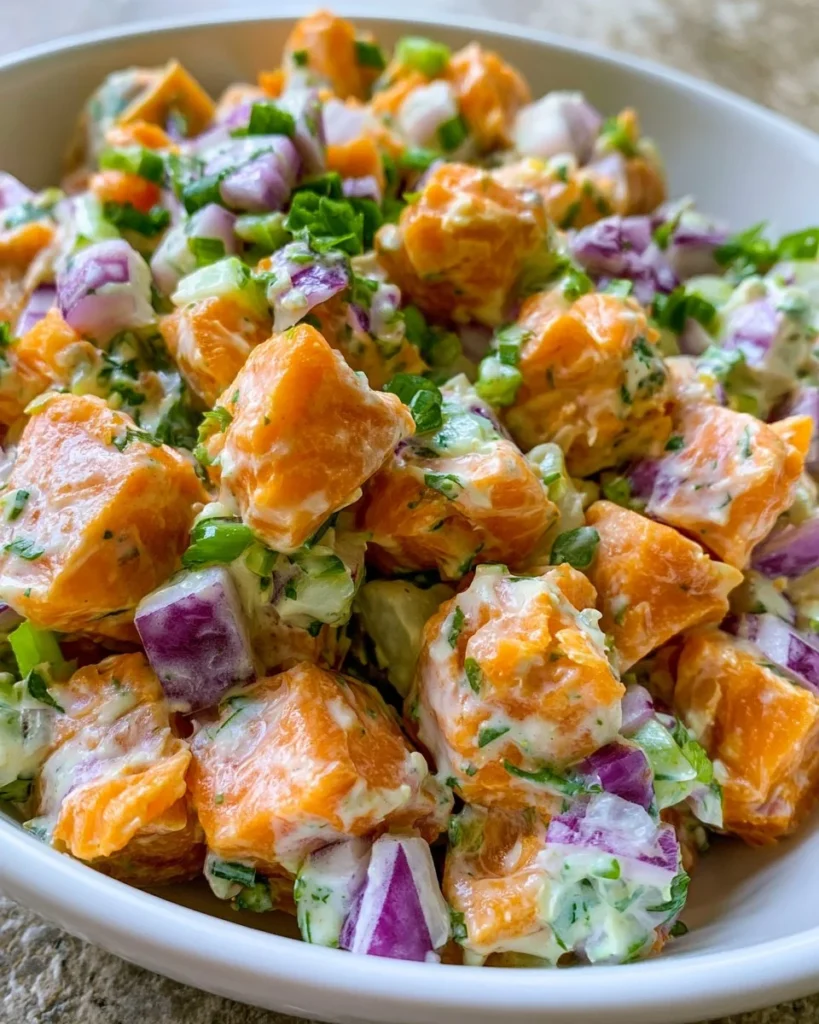 Vegan Jamaican Potato Salad with colorful vegetables and creamy dressing