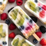 Delicious homemade yogurt popsicles in vibrant flavors ready to be enjoyed