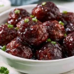 Delicious grape jelly meatballs served in a bowl for a quick appetizer.