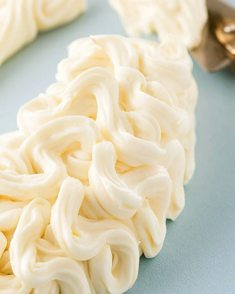 Delicious American buttercream frosting prepared for cake decoration.
