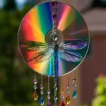 Sparkling rainbow dragonflies made from recycled CDs for sun catchers