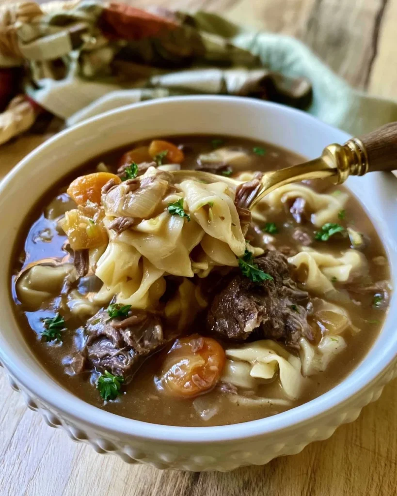 Delicious Crock Pot beef and noodles served in a bowl